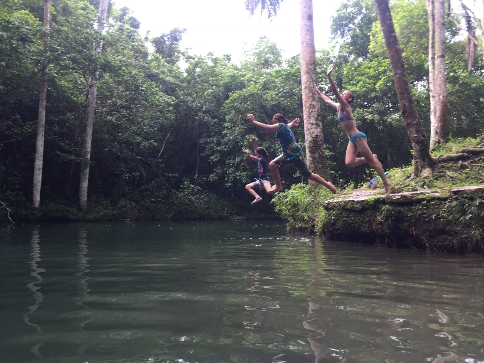 People jumping in the water