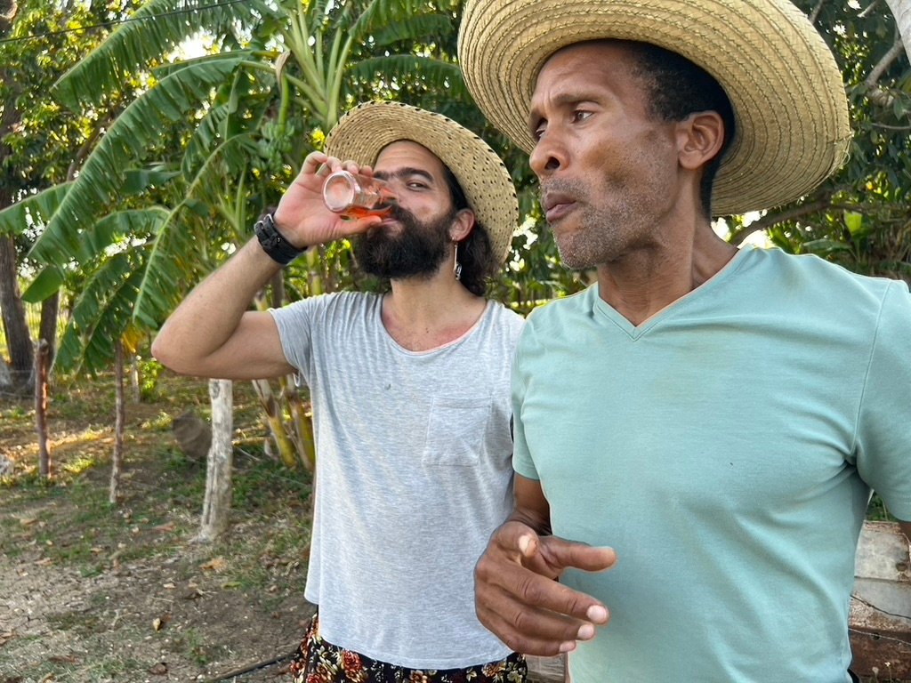 Two friends standing on a farm